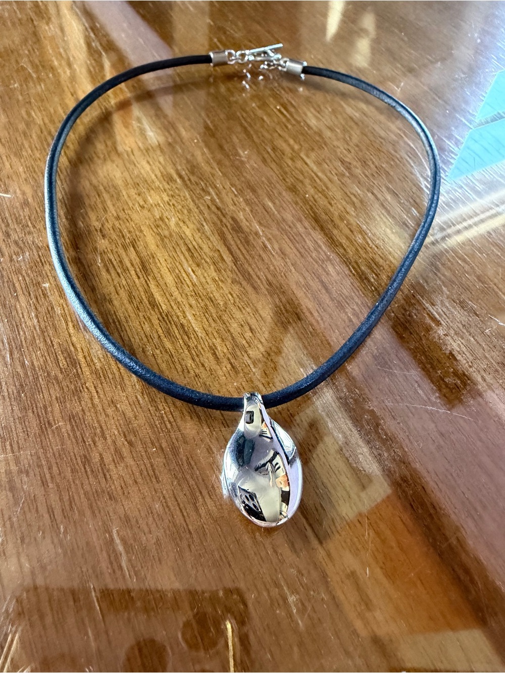 Beautiful vintage Lauren Ralph Sculpted Teardrop Pendant on Black Cord